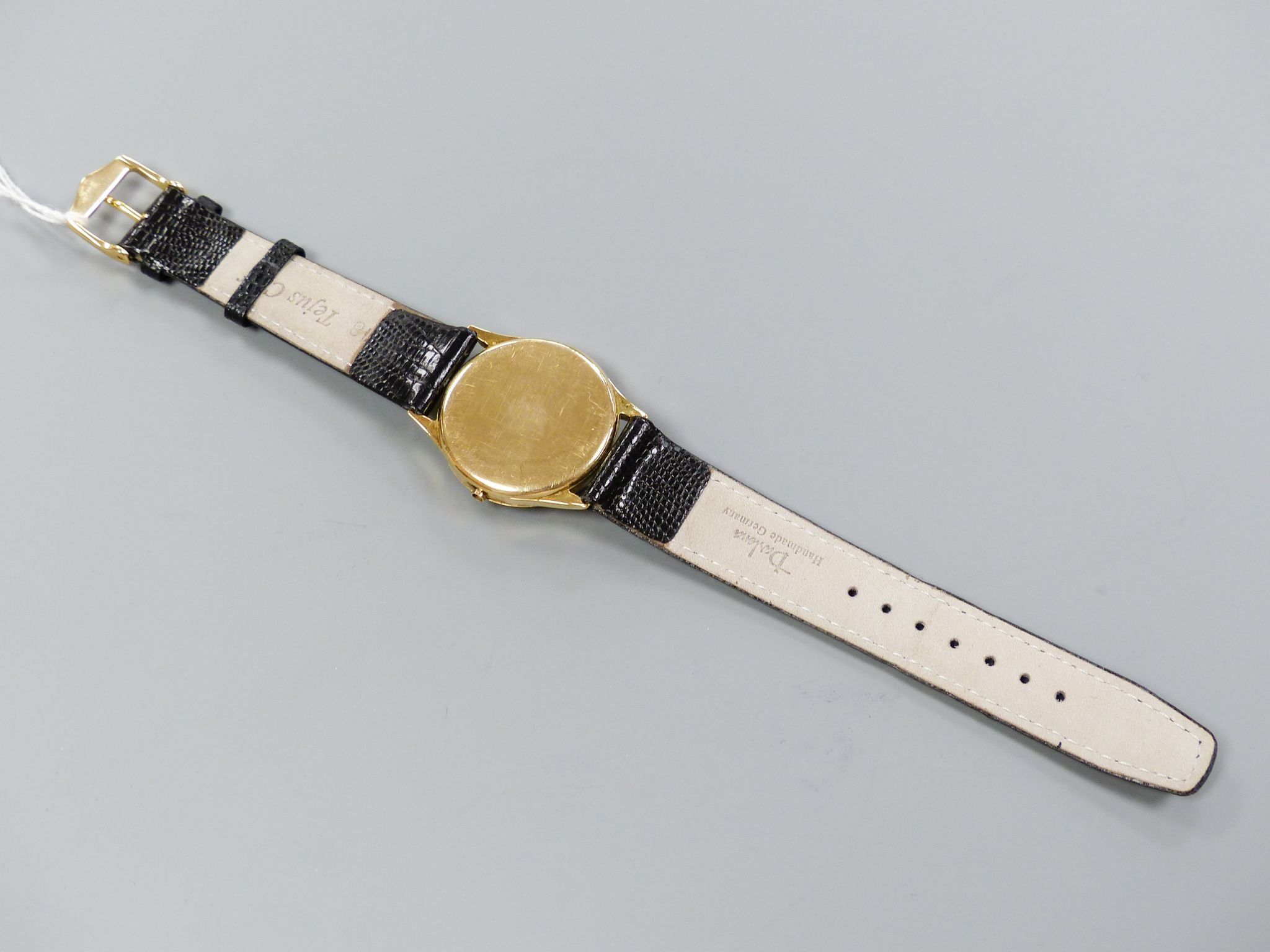 A gentleman's 14k yellow metal Zenith manual wind wrist watch, with subsidiary seconds, on later strap, winding crown loose but present